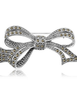 Srebrna broszka z markazytami w kształcie kokardki