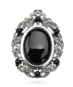 piękna owalna srebrna broszka z onyksem i markazytami