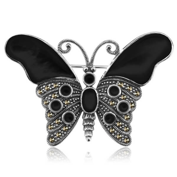 Broszka srebrna motyl z onyksami i markazytami