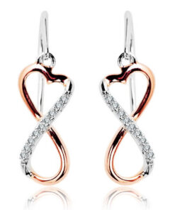 Wiszące biało-różowe kolczyki z diamentami