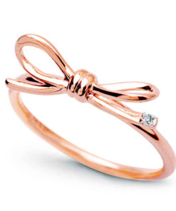 Staviori | piękny pierścionek kokardka w różowym złocie z diamencikiem