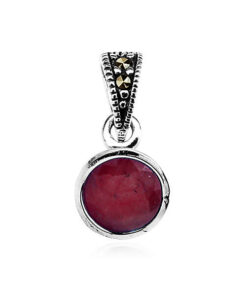 Srebrny wisiorek z naturalnym rubinem i markazytami