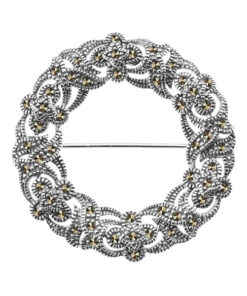 srebrna piękna okrągła broszka z markazytami