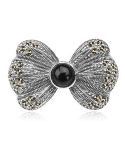 srebrna broszka kokarda z onyksem i markazytami