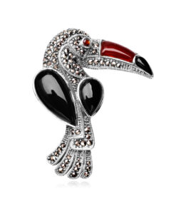 Broszka srebrna tukan z onyksami, granatami i markazytami